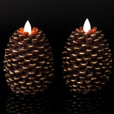 Wondise flameless pine cone candles in brown set of 2 on a table for cozy ambience