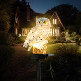 XURLEQ garden solar light: owl on a stake provides warm walkway illumination