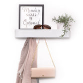 Xympo modern wall-mounted coat rack demonstrates clean lines for a clutter-free entryway.