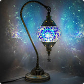 Yarra-Decor Turkish Moroccan lamp with bronze base casting a warm bedside glow