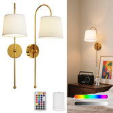 Yinglap wall sconces in gold glow, adding modern ambiance to your living room.