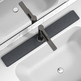 Yinoos faucet mat 30x4 inches soaking up spills quickly.