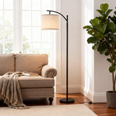 YJSQOEOE Arc Floor Lamp base provides sleek stability in living spaces.