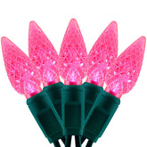 YULETIME pink C6 strawberry lights on a 70-LED strand for vibrant ambient lighting.