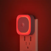 YUNLEX red night light 2-pack with motion sensor ideal for hallways and bedrooms.