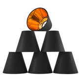 Zapanopan clip-on lamp shade with black exterior and gold interior for warm, inviting light