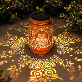 ZASOWUUO solar owl lantern glowing softly on a patio for cozy evenings.