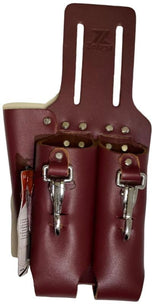 Zeluga saddle leather three-pocket tool holder on belt for quick access.