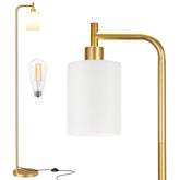 Ziisee floor lamp with gold finish and frosted shade in a living room.