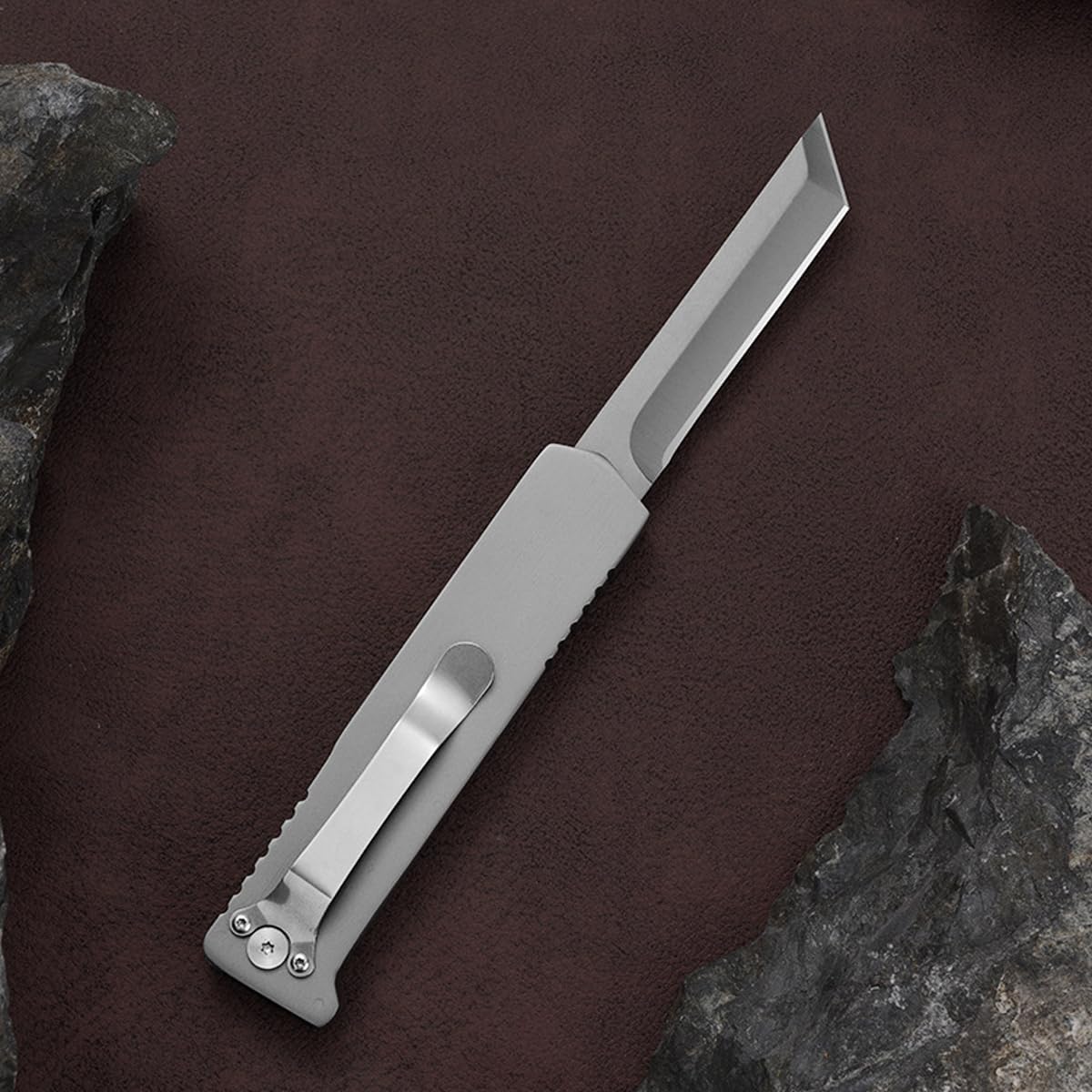 10MOONS Pocket Knife belt clip keeps it secure on the go.