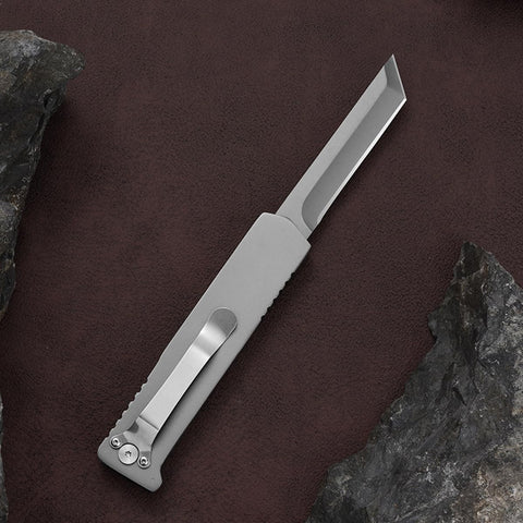 10MOONS Pocket Knife belt clip keeps it secure on the go.