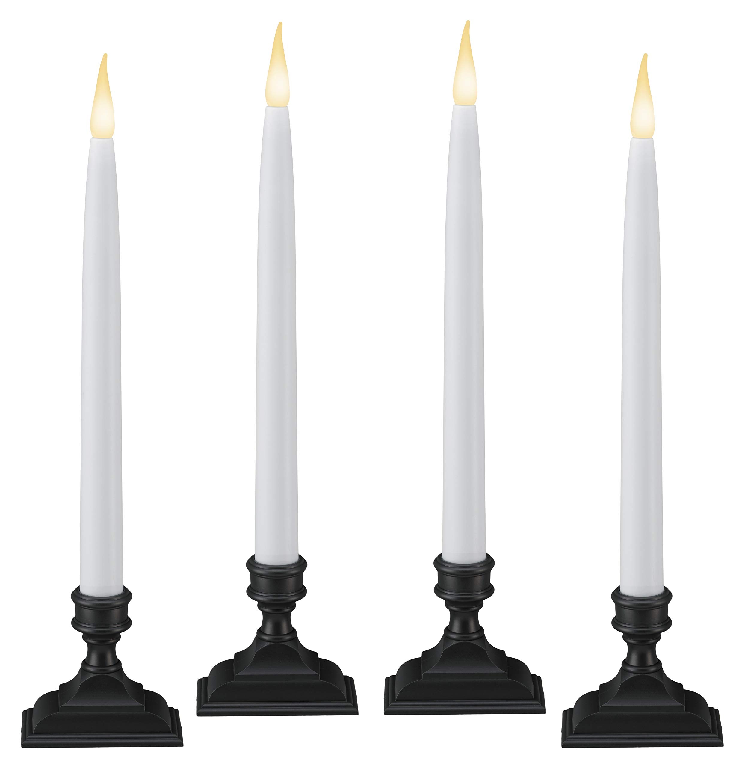 612 Vermont antique bronze LED taper candles grouped for a classic window display.