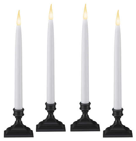 612 Vermont antique bronze LED taper candles grouped for a classic window display.