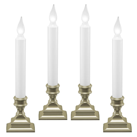 612 Vermont window candle pewter pack-4 on sill with inviting exterior glow.