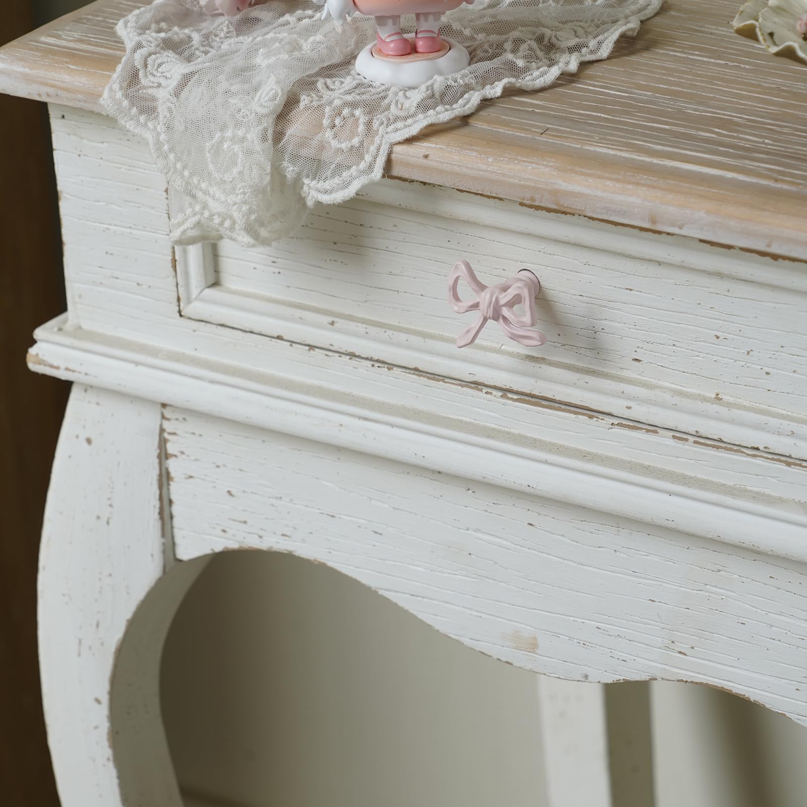 6 Funpop pink bow knob on dresser demonstrates updated style