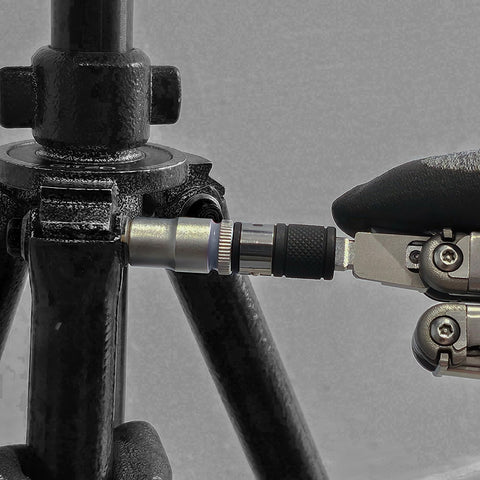 Set screws secure the adapter to flat bit attachments