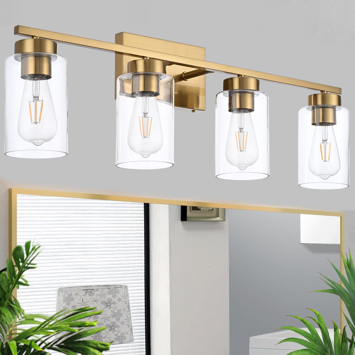 A1A9 brushed brass 4-light vanity with clear glass shade illuminating mirrors elegantly