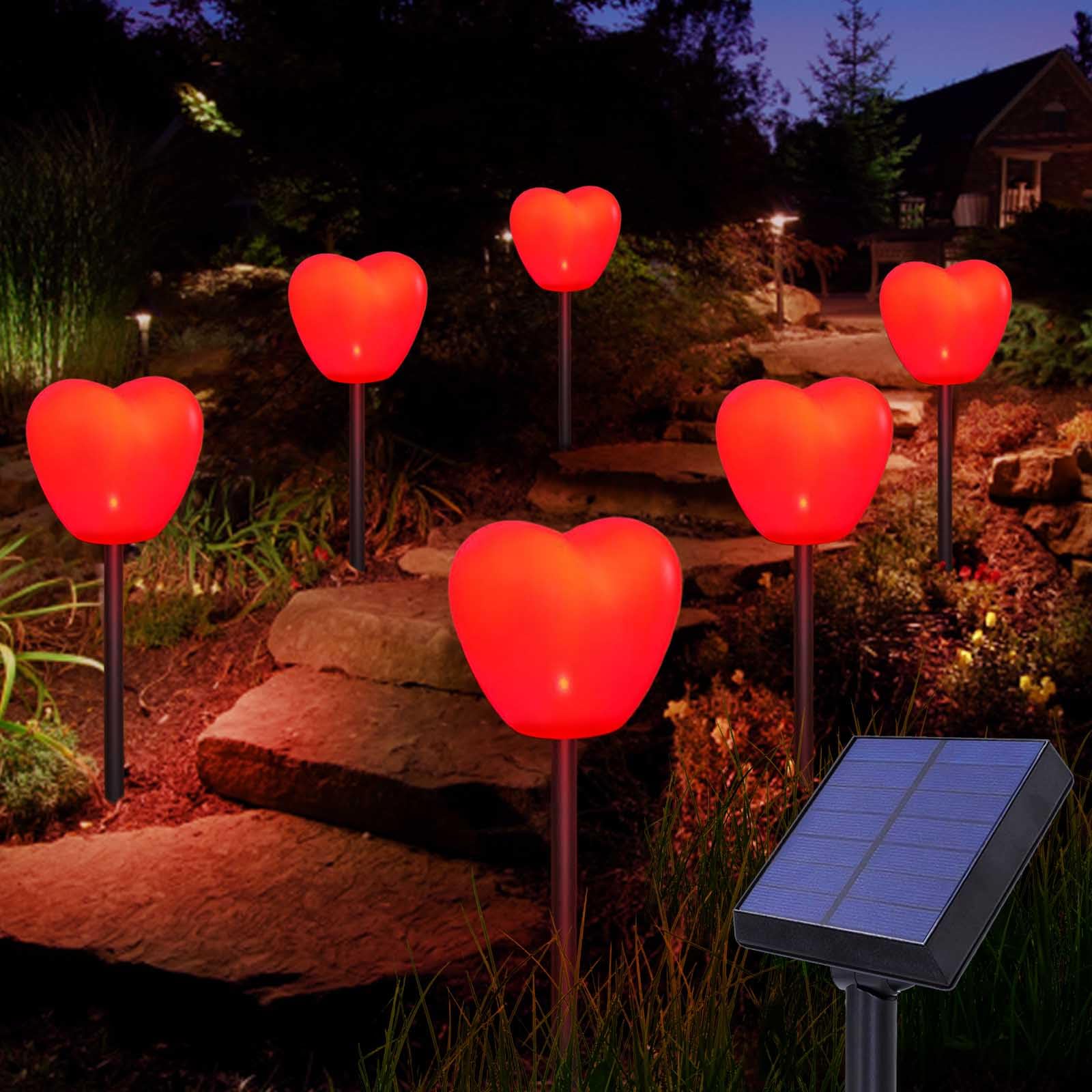 Abkshine solar heart lights illuminate garden path with warm red glow