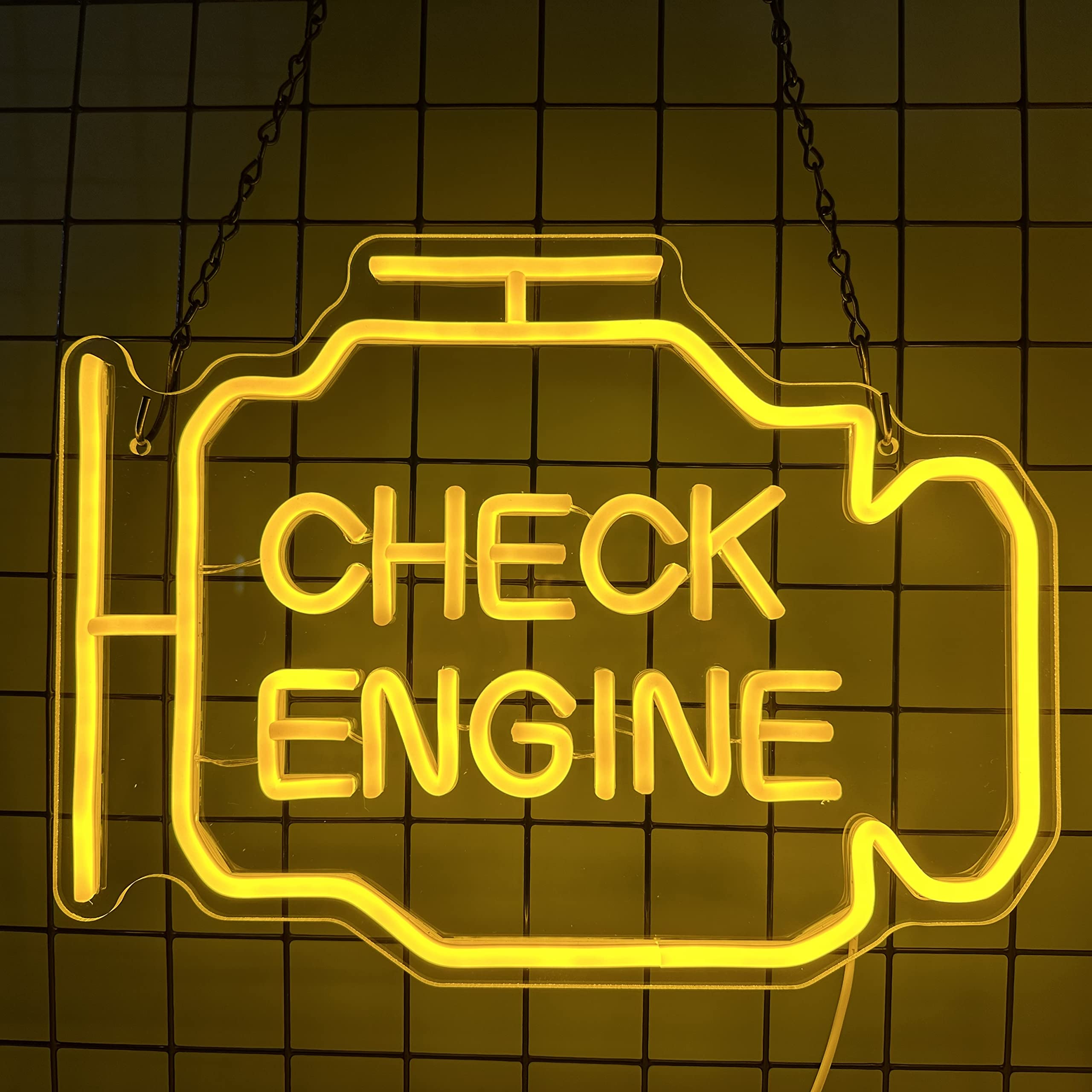 Abooly neon sign above a bar wall adding character for auto enthusiasts