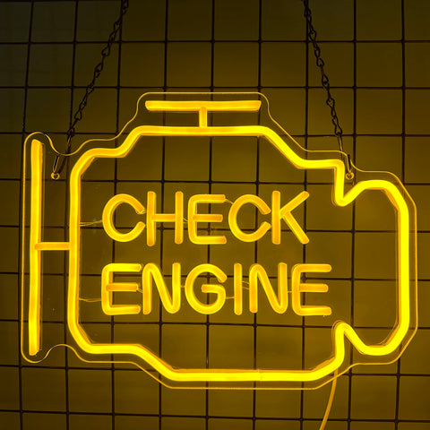 Abooly neon sign above a bar wall adding character for auto enthusiasts