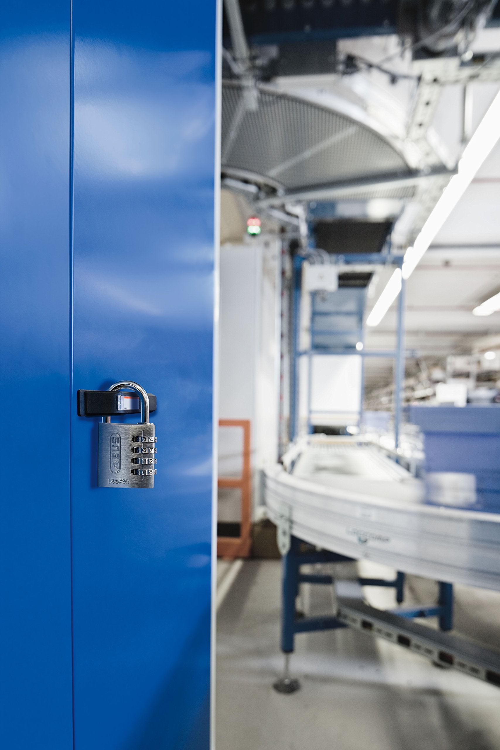 ABUS 145/40 padlock securing luggage during travel for reliable protection.