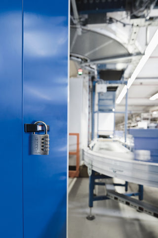ABUS 145/40 padlock securing luggage during travel for reliable protection.
