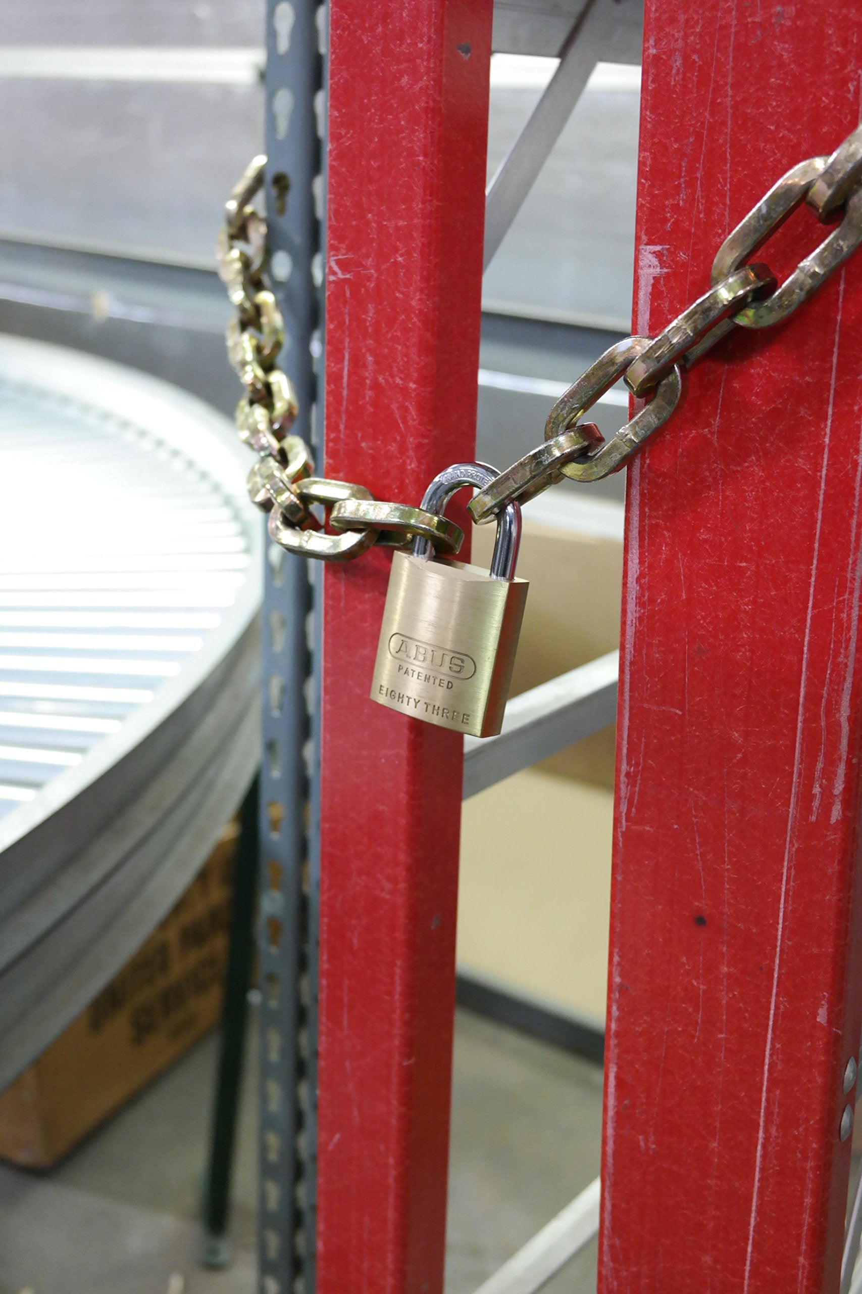 ABUS 83/45 brass padlock showing shackle change and Z-bar feature.
