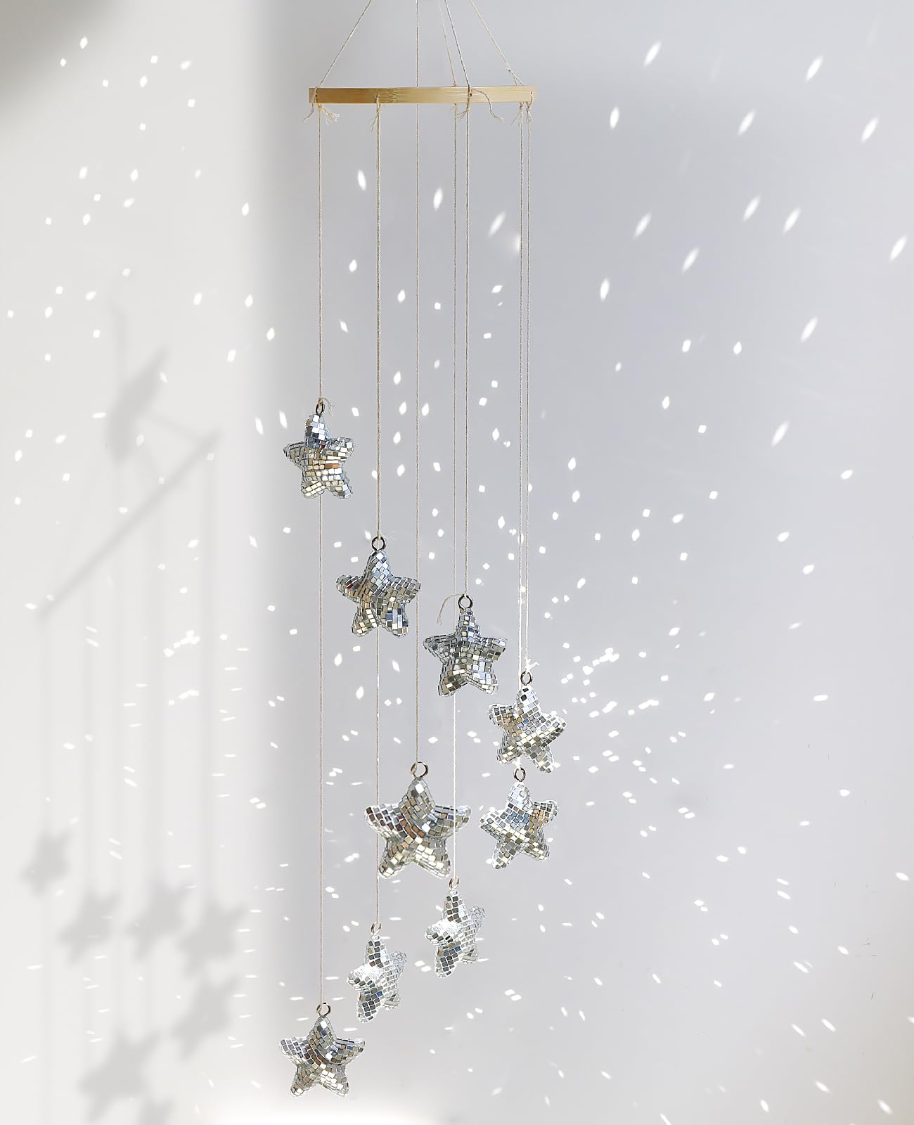 AceList disco ball sun catcher creates sparkling sunlight reflections in windows
