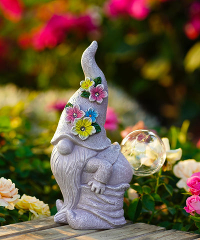 Acgarten night glow gnome provides warm illumination for patios and paths.