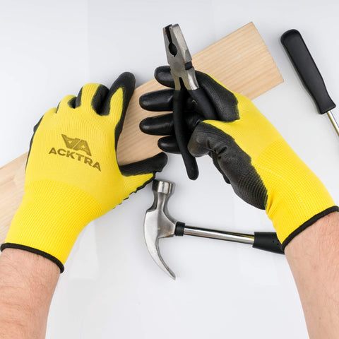ACKTRA WG002 black gloves with palm coating for reliable grip.