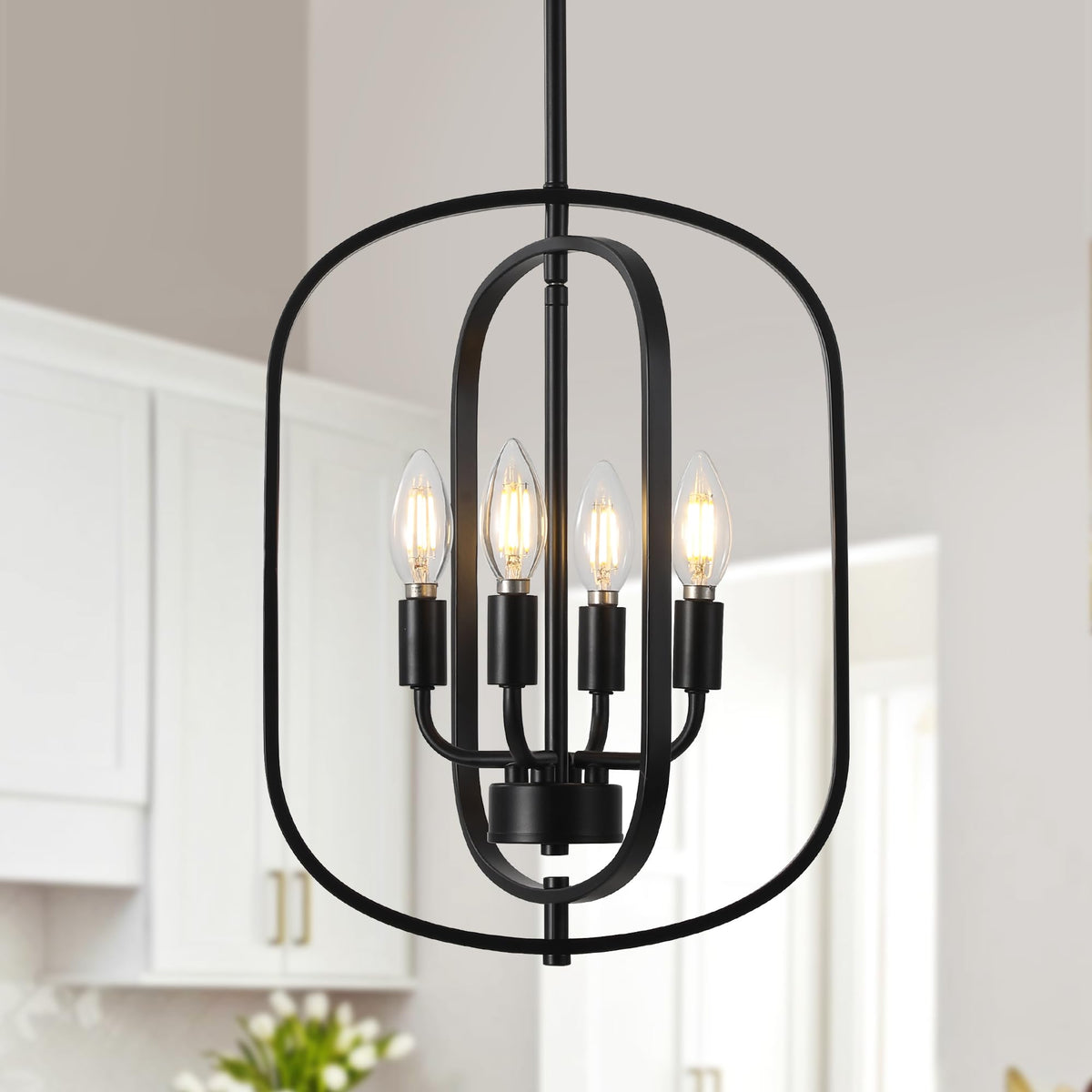 ACNKTZ black chandelier with oval frame over a dining table for ambient dining lighting