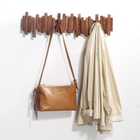 Acsigesn walnut wood grain close-up highlighting craftsmanship and warm finish.