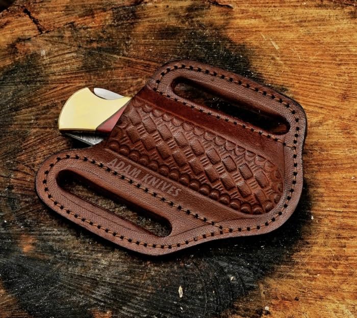 ADAM KNIVES leather sheath with slanted design for secure belt carry.