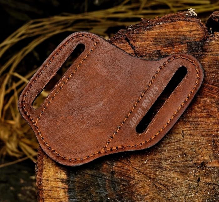 ADAM KNIVES tooled leather sheath adds artisanal flair and durability.