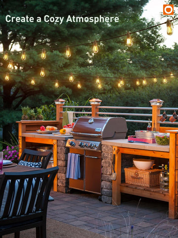 Addlon party dining outdoors with inviting illumination