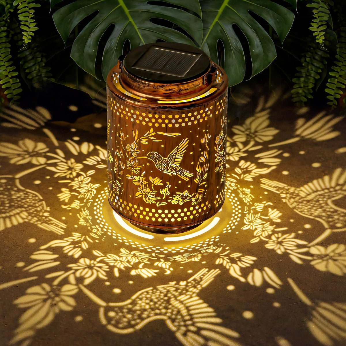 Adebime hummingbird-iris projection lantern lights garden with whimsical birds.