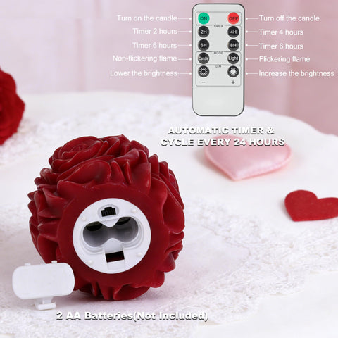 Close-up of AFINETH rose candles producing soft glowing warmth