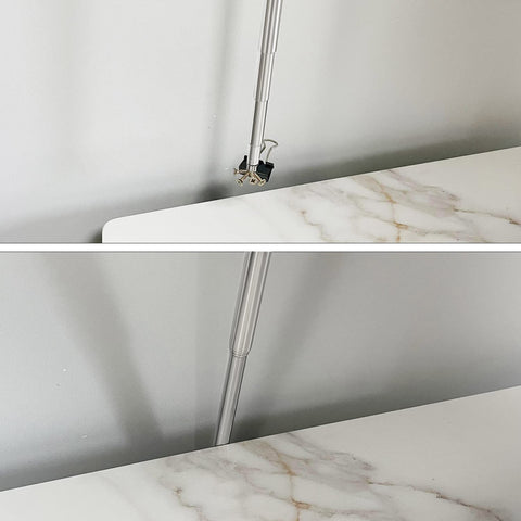 Ahrylxy packaging shows two hooks included with the pole.