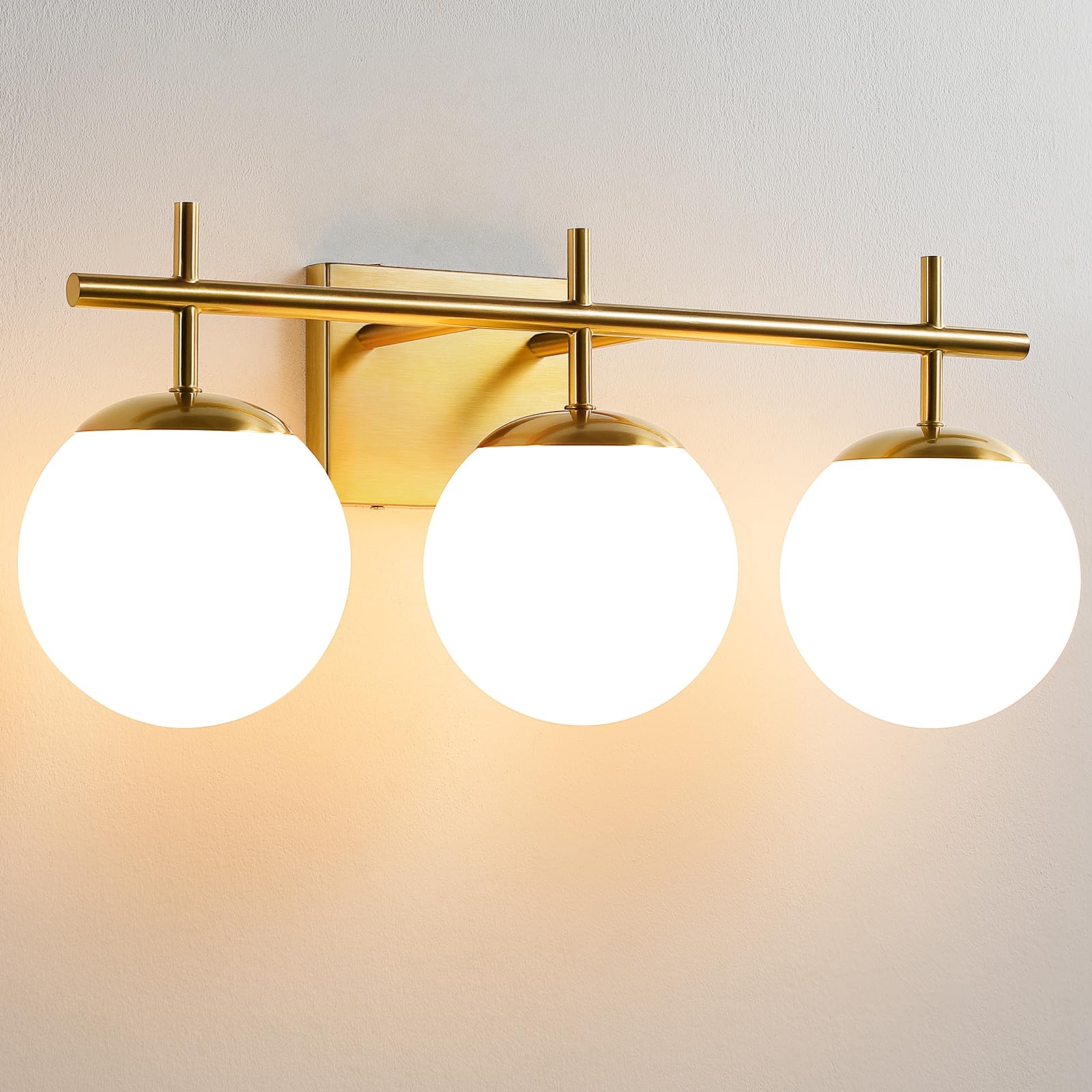 AIJIASI gold bathroom light fixture over mirror with 3-light setup for warm, even illumination
