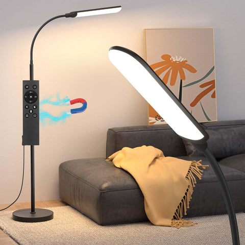 Aisutha LED floor lamp with bright head illuminating a large living room.
