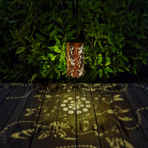 AITENISEN gold copper-tone lantern adds elegant ambience to yard decor.