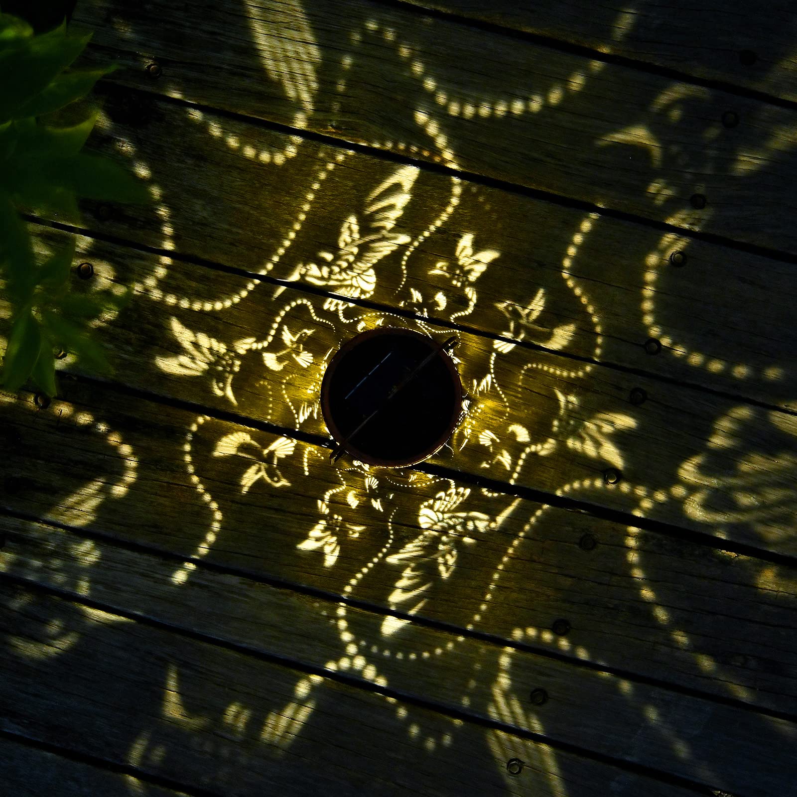 AITENISEN hanging lantern highlights a patio with warm, energy-free glow.