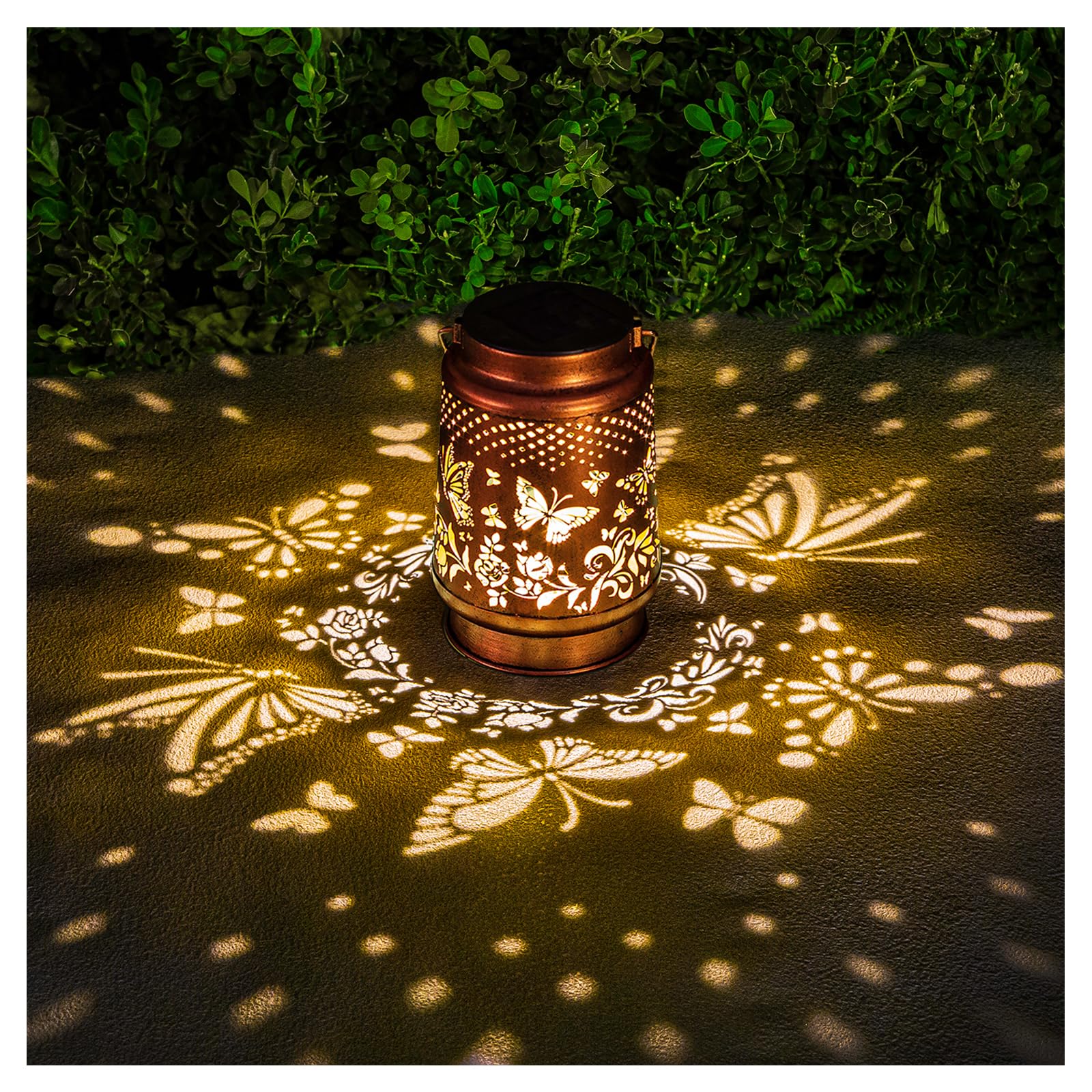 AITENISEN solar lantern butterfly garden decor casts a warm outdoor glow.