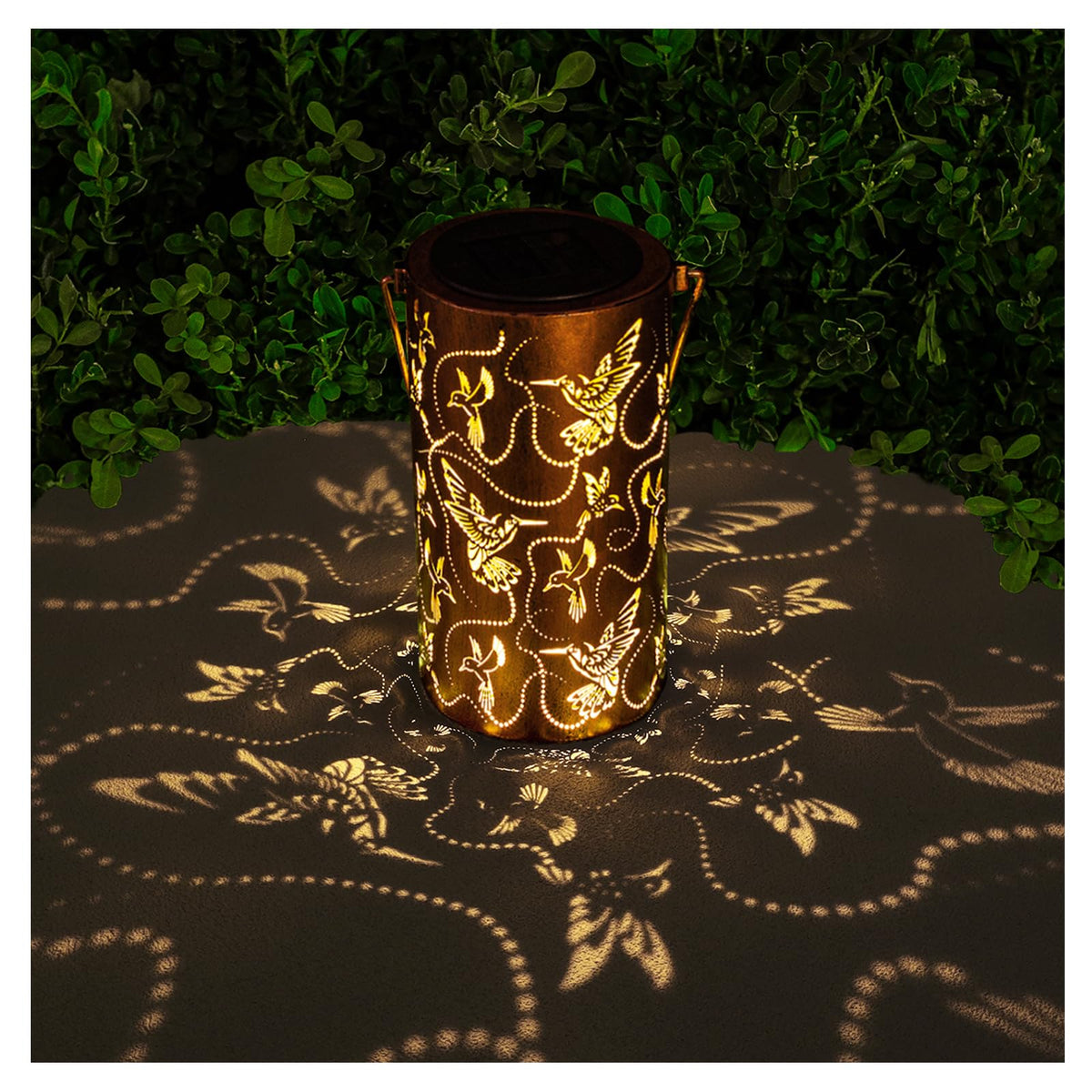 AITENISEN solar lantern with hummingbird decor lights outdoor spaces at dusk.