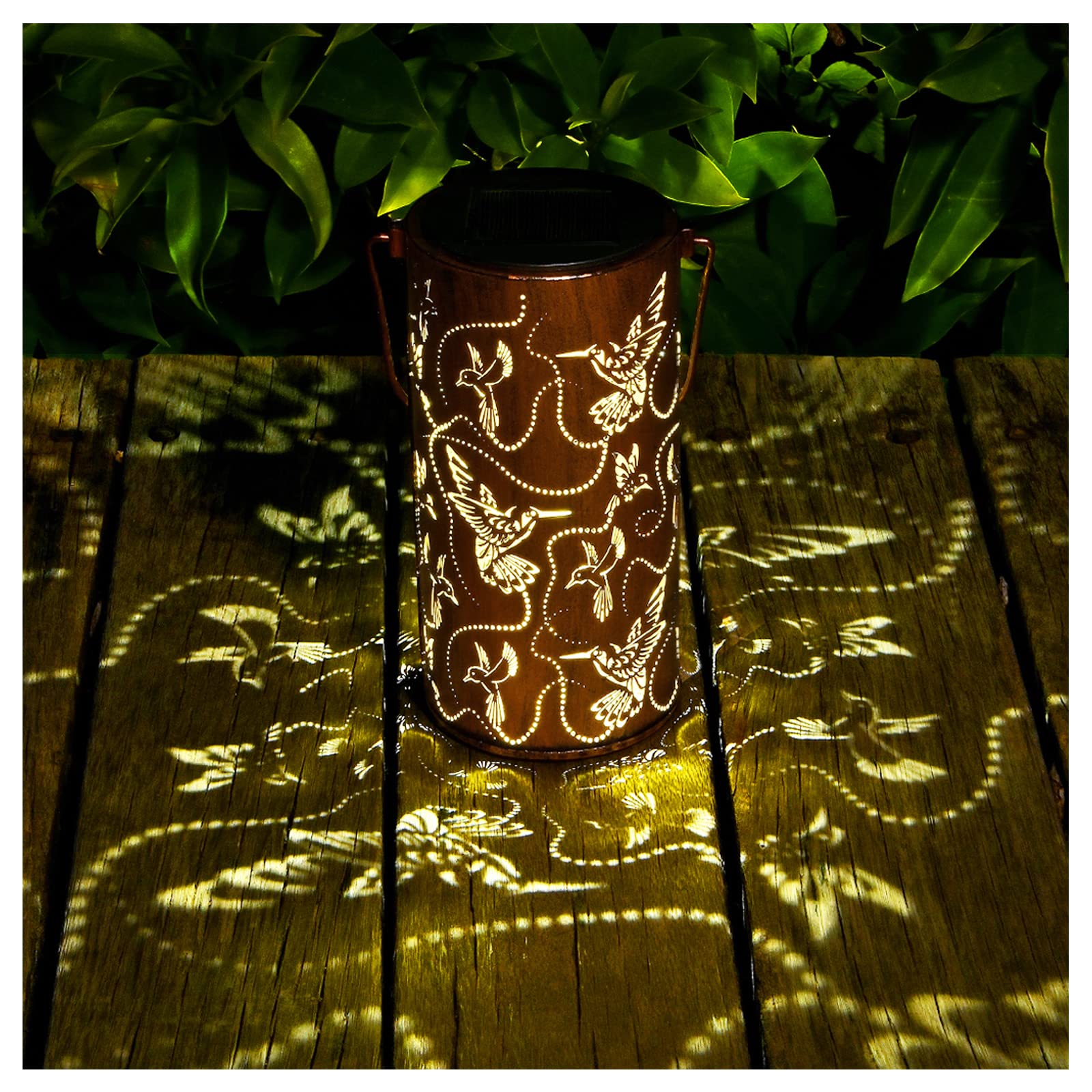 AITENISEN waterproof solar lantern shines along garden paths after rain.