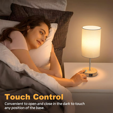 AKASUKI table lamp highlighting dual USB ports charging two devices at once.