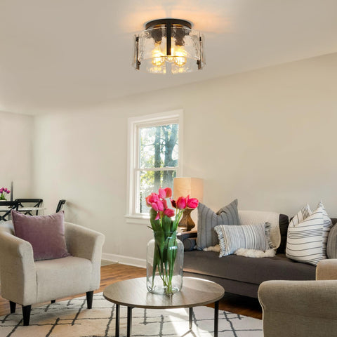 AKLMXCG seeded glass shade diffuses light for refined living room ambience.