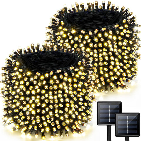 Albelt 2-pack 170ft solar string lights outdoor illuminate a garden path.
