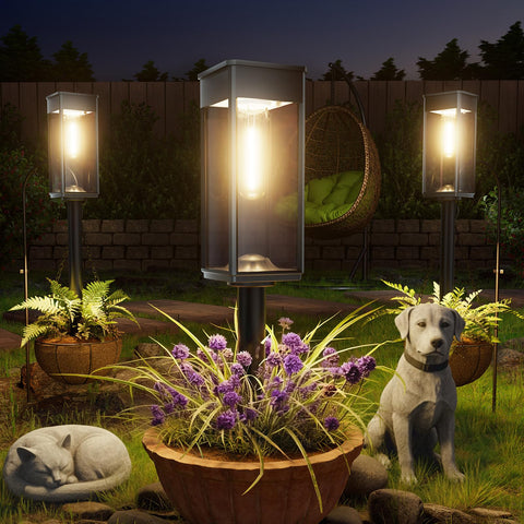 ALFIOT Solar Pathway Lights illuminate a garden path with warm white glow.