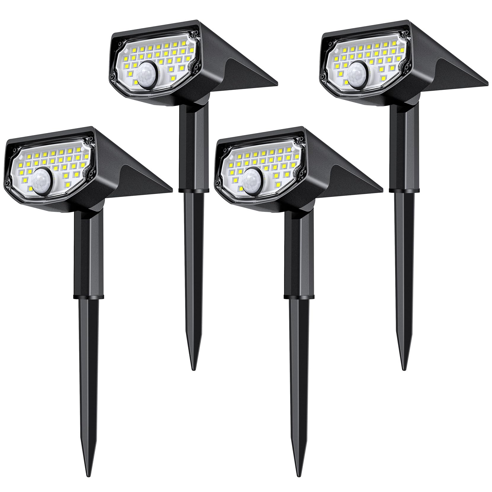 AloftSun pack of solar motion sensor lights illuminating a yard at night.